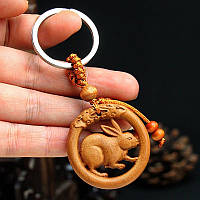 Витончений дерев'яний брелок у формі знаків зодіаку за китайським календарем ЗАЄЦЬ (КРОЛИК)