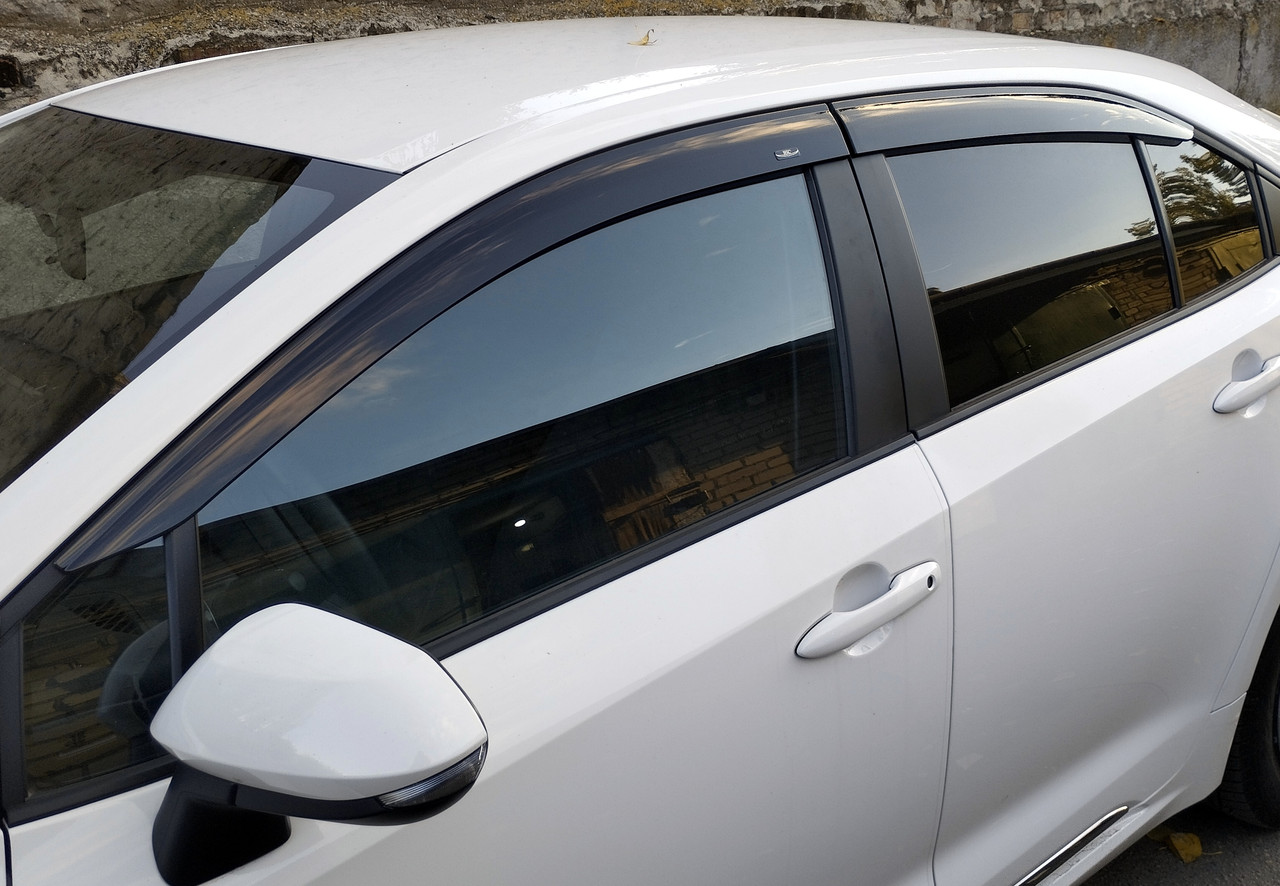 Дефлектори вікон (вітровики) Toyota Corolla (сида) 2019- (Hic)