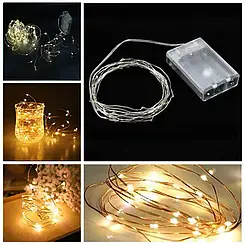 Світлодіодна гірлянда нитка краплі роси 10 м 100 LED на 3 батарейках теплий білий Kt