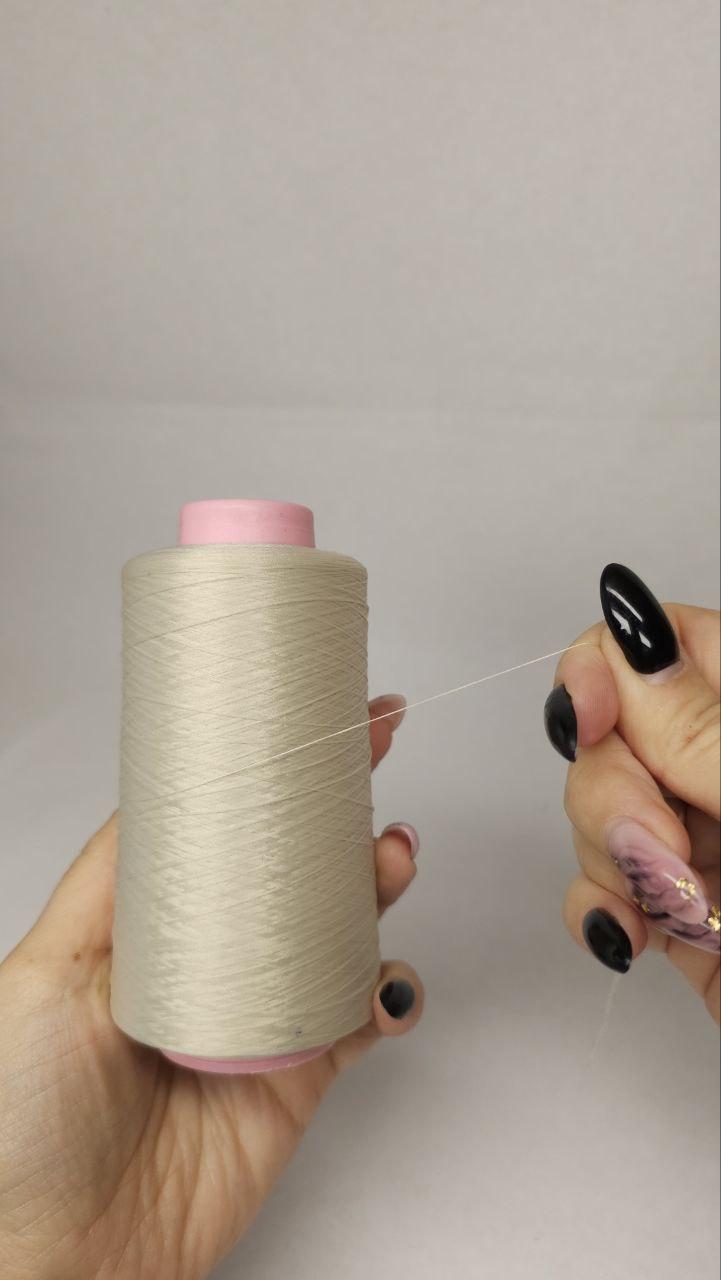 Нитки для оверлока колір "світлий беж 6345" 5000 м 16.7 tex