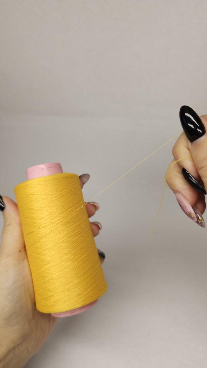 Нитки для оверлока колір "жовтий 0025" 5000 м 16.7 tex
