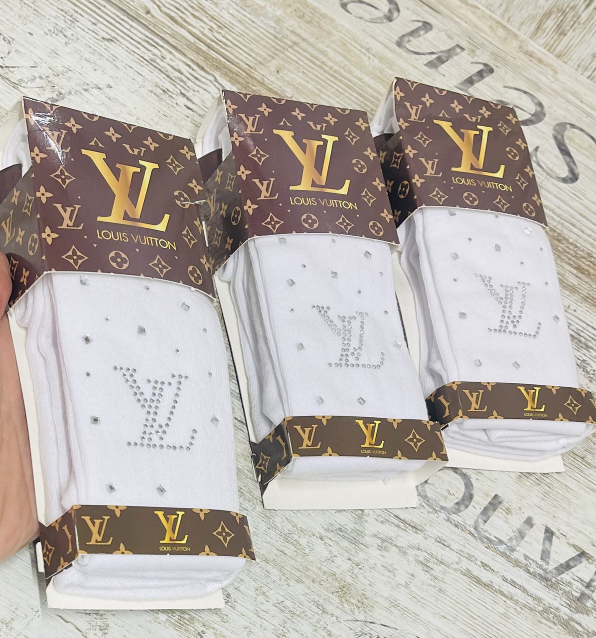 Білі ошатні колготки для дівчаток із камінчиками LV