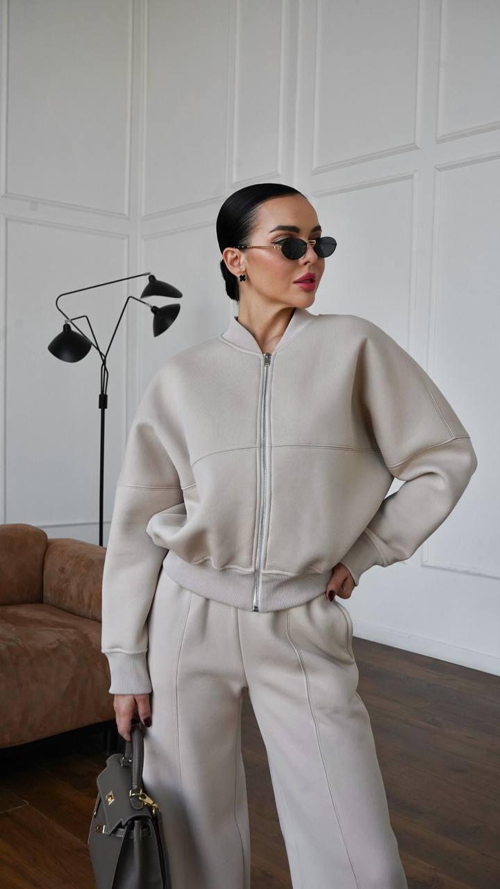 Жіночий теплий костюм на флісі з кофтою на блискавці та розкльошеними штанами (р. 42-48) 4so3761, фото 1