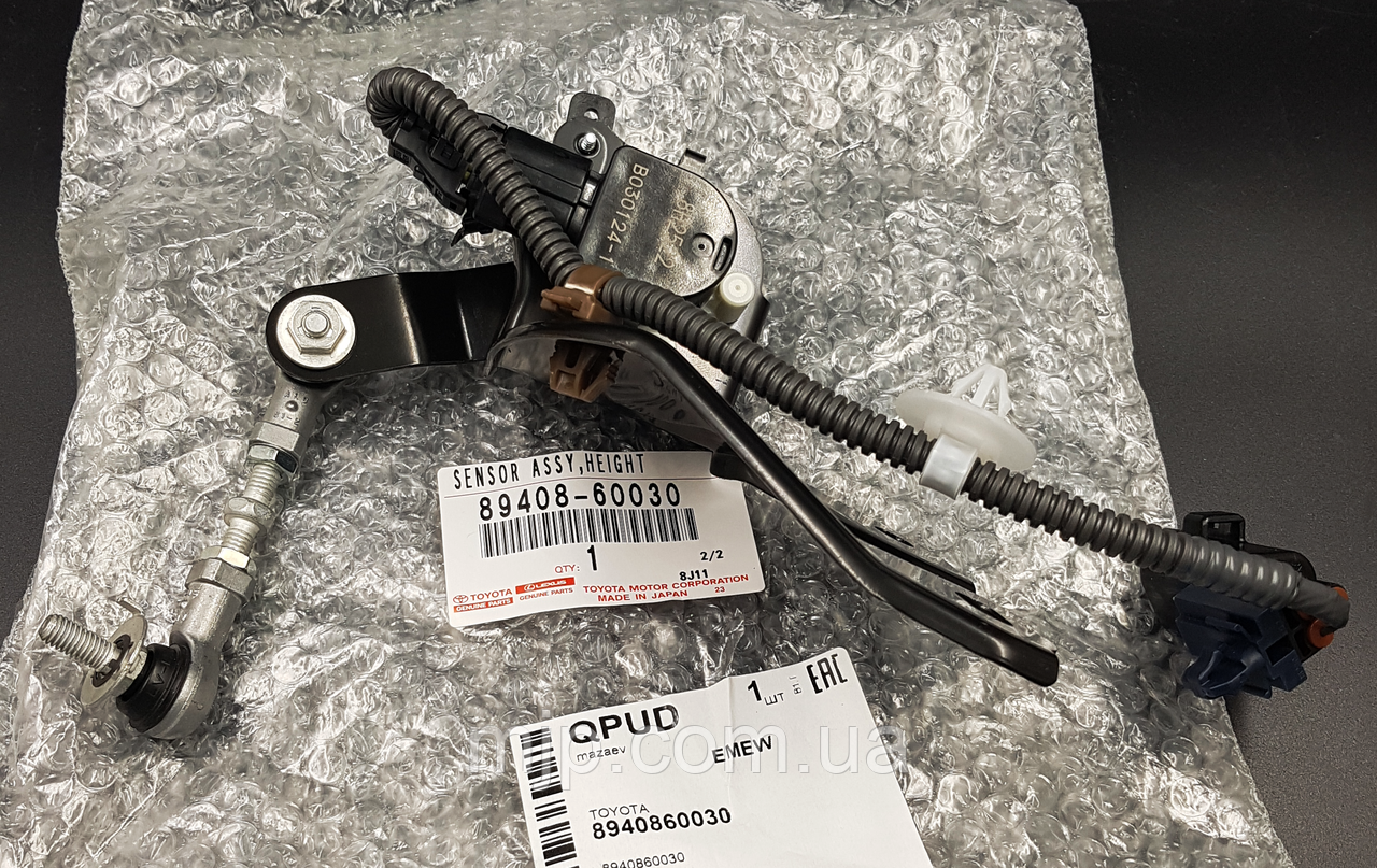 Оригінальний датчик підвіски задній лівий 89408-60030 - фото 1 - id-p560300541
