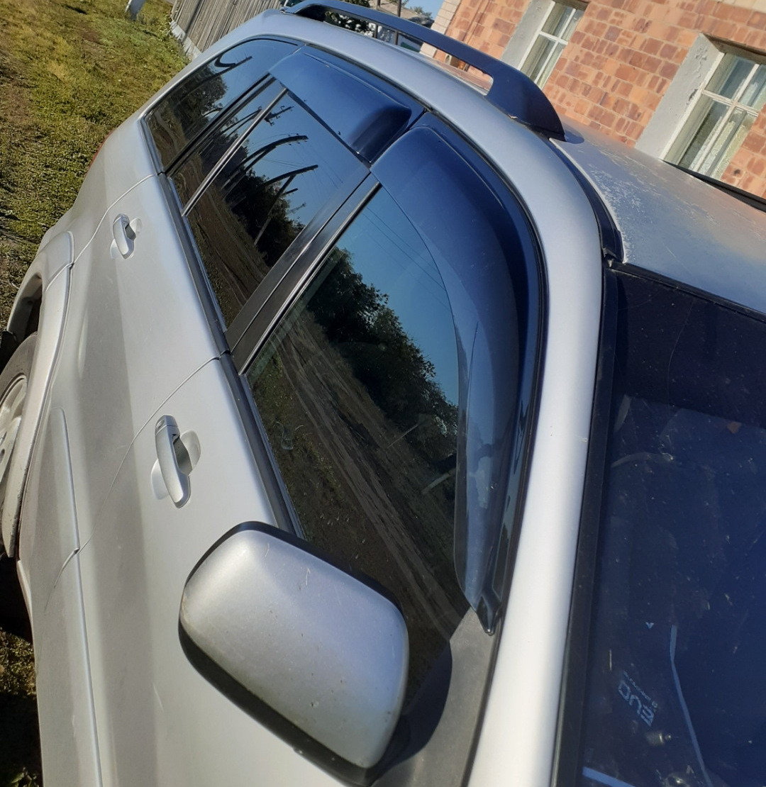 Дефлектори вікон (вітровики) Toyota RAV 4 2000-2006 (ATM)