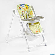 Дитячий стільчик для годування Joy K-94011, регульований по висоті, м’який ПВХ‑чохол, знімний столик на 4 коліщатках з кошиком, фото 4