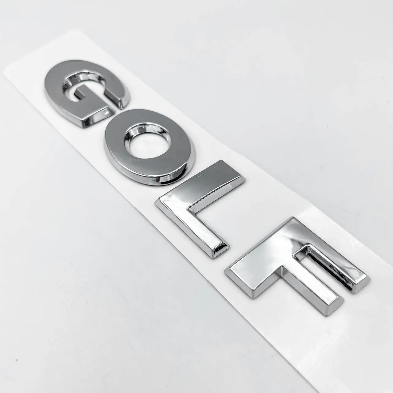 Емблема напис Golf для Volkswagen (2002-2020р) Хром 121x26 мм (на скотчі) 5G9853687 2ZZ, фото 1