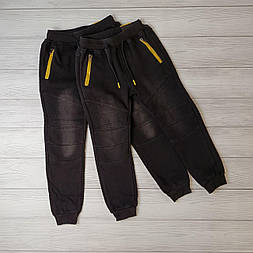 Дитячі штани на флісі чорного кольору в розмірі 164