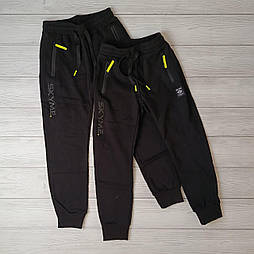 Теплі спортивні чорні штани для хлопчика в розмірі 152 і 164