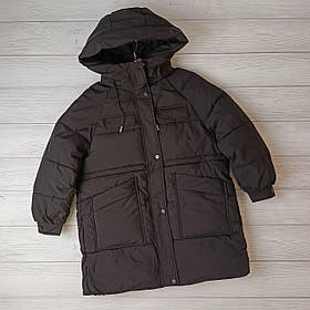 Чорна зимова куртка пуховик на дівчинку в стилі оверсайз