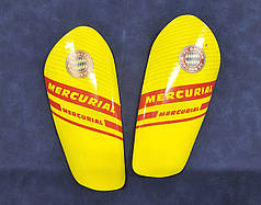 Щитки футбольні клубні жовті 17 см Mercurial 1008M
