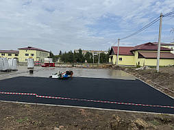 Монтаж двухслойного покрытия типа Conipur 2S для волейбольной площадки. Чугуев.  4