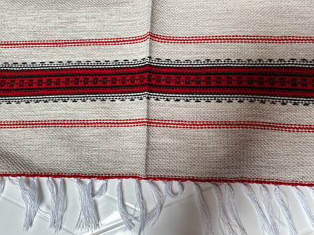 Ткані скатертини, серветки, доріжки та набори на стіл