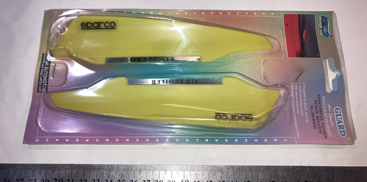 Спойлер на двірники жовті