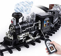 Залізна дорога - поїзд що випускає пар з пультом управління