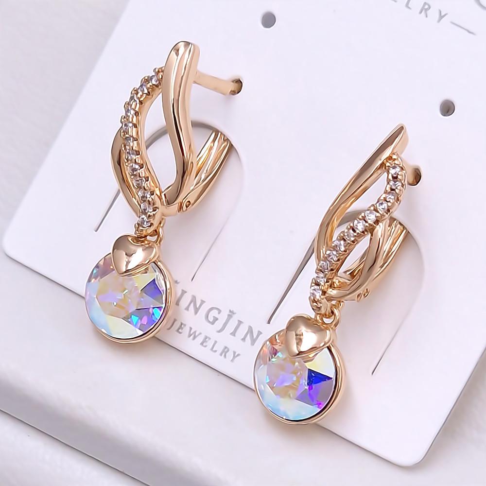 Сережки XР. Позолота 18К. Камені: Swarovski бензинового кольору та циркон. Довжина: 27 мм. Ширина: 7 мм.