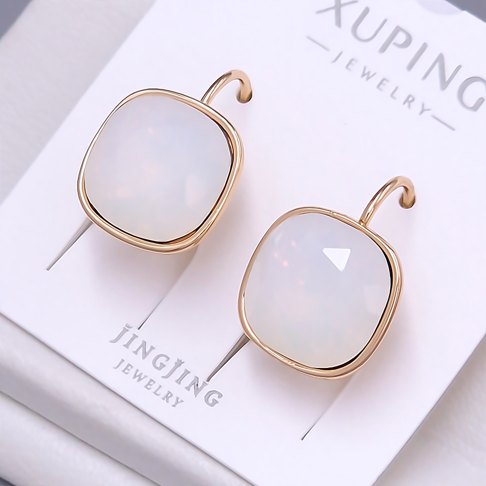 Сережки XР. Позолота 18К. Камені: Swarovski. Довжина: 18 мм. Ширина: 13 мм.