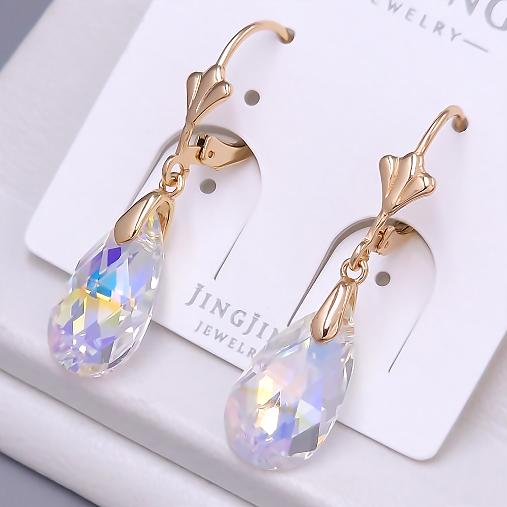 Сережки XР. Позолота 18К. Камені: Swarovski бензинового кольору. Довжина: 35 мм. Ширина: 10 мм.