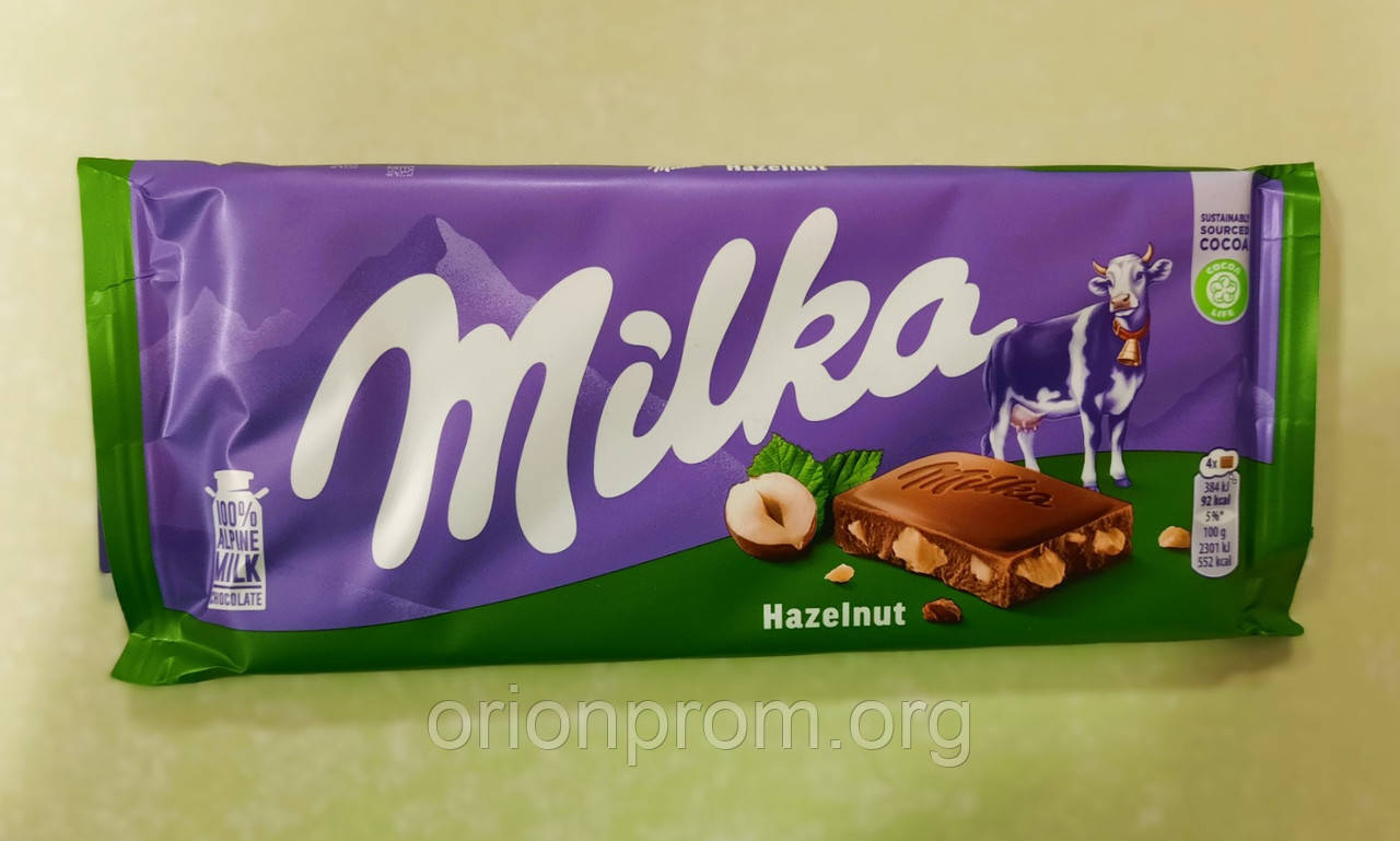 Шоколад Milka з подрібненим фундуком молочний 100 г