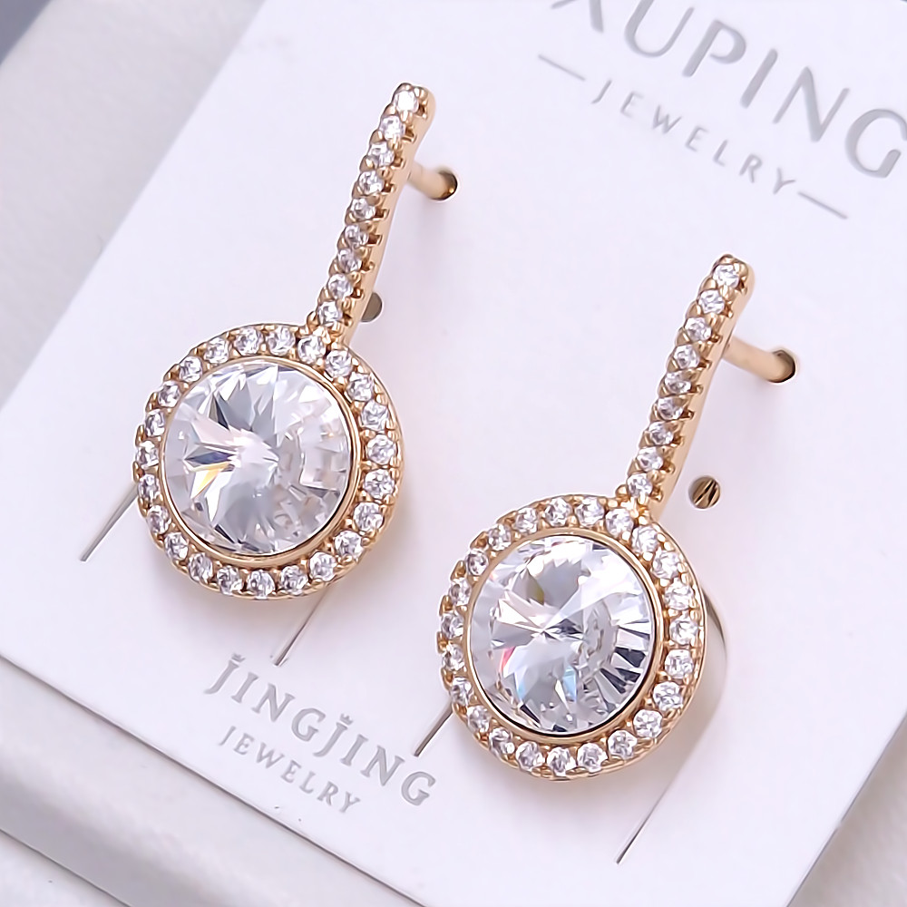 Сережки XР. Позолота 18К. Камені: Swarovski та циркон. Довжина: 23 мм. Ширина: 12 мм.