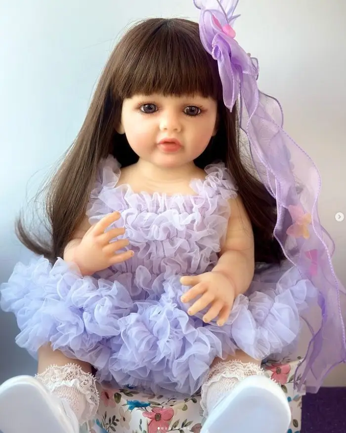 Лялька вінілова 55см, ручна робота, брюнетка в бузковій сукні, Reborn Baby Doll 49