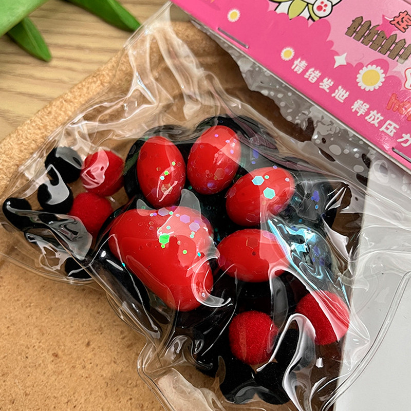 Іграшка Чорна з червоним таба лапка - таба сквіш-антистрес для дітей (l_13355), фото 1