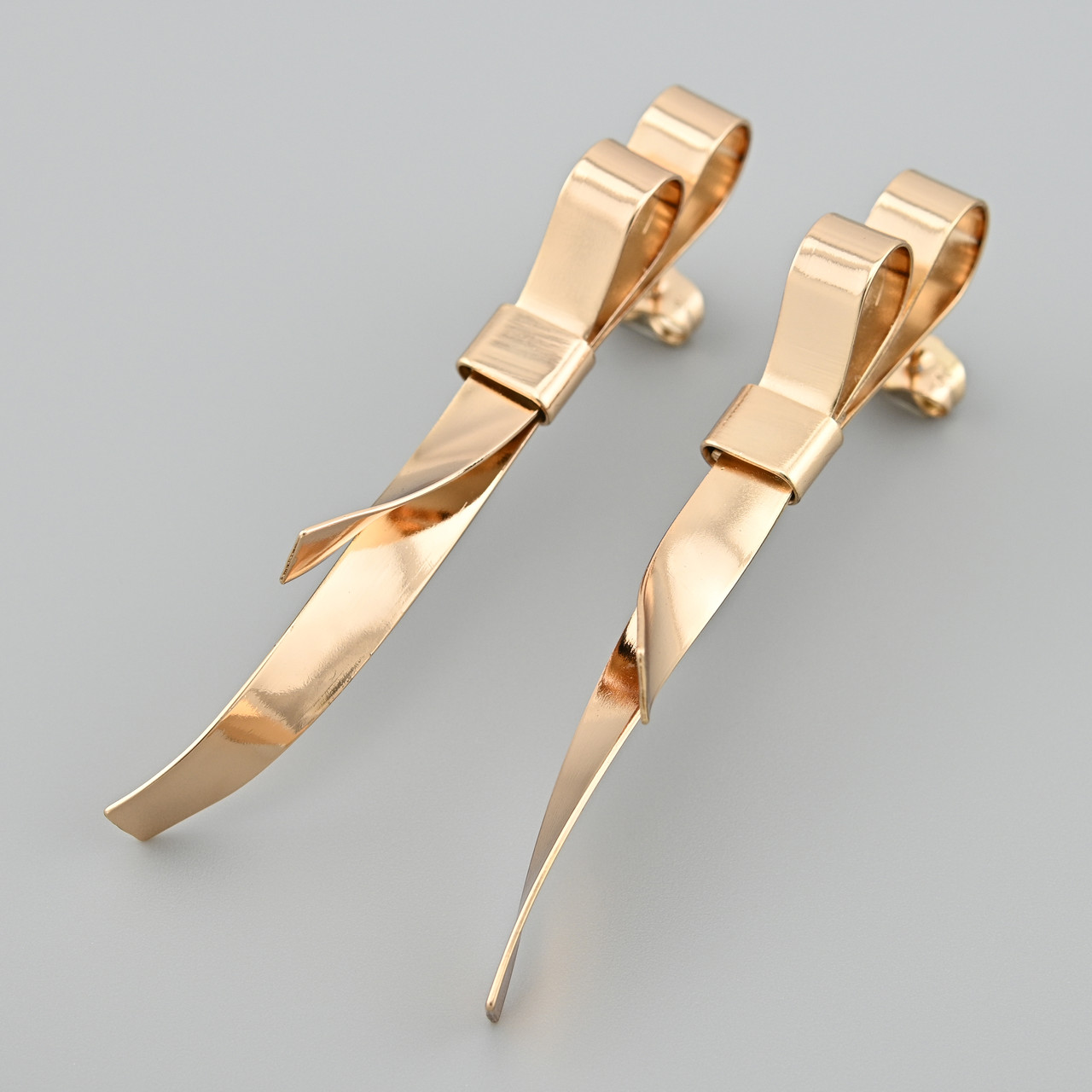 Сережки Бантики 48750 розмір 70х6 мм вага 10.5 г позолота 18К, фото 1