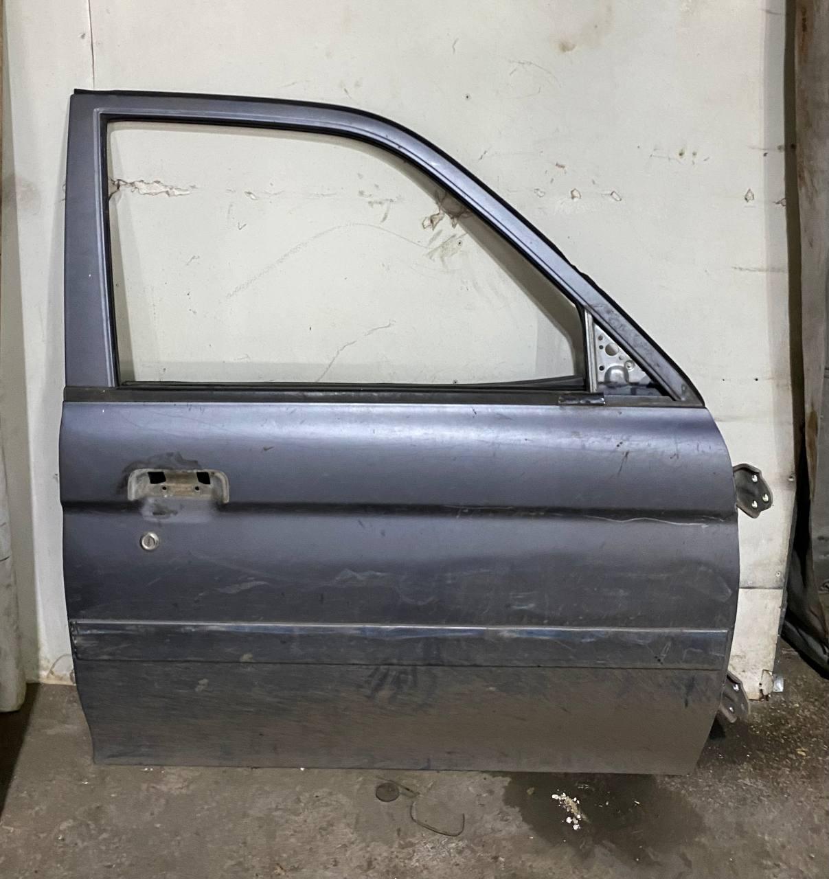 Двері передні, права Mitsubishi L200 1996-2005 рр Б\В, фото 1