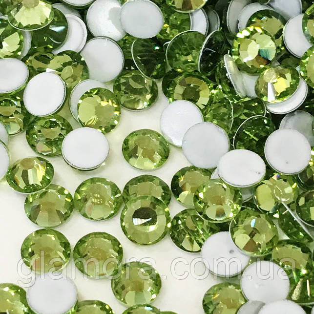 Стрази DMC+ (Корея).Lt Peridot ss16(4mm).Цина за 100 шт.