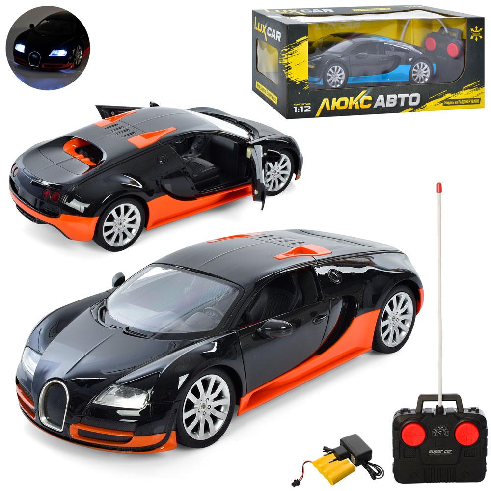 Машина M 4915 радіокер., 1:12, акум, світло, гумові колеса, двері, що відкриваються, 2кол., кор., 46,5-18-19см., фото 1