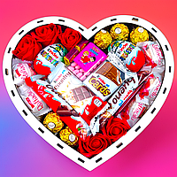 Солодкий новорічний подарунковий кіндер сюрприз дочці на Новий рік, смачне серце зі солодощами на подарунок дівчині на Різдво