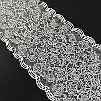 Стрейчеве (еластичне) мереживо білого кольору ("теплий" відтінок) шириною 23 см.