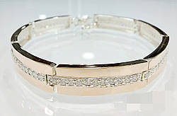 Срібний браслет з золотими пластинами