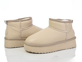 Жіночі зимові бежеві теплі шкіряні короткі уги