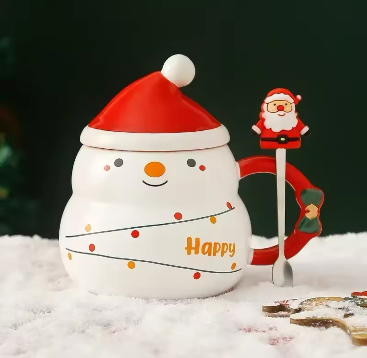 Об'ємний білий кухоль у формі милого сніговичка з ложечкою прикрашеною фігуркою Діда Мороза. Подарункова упаковка
