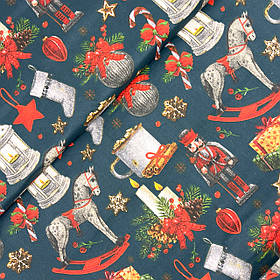 Польська бавовняна тканина "Новодні іграшки, конячки, подарунки на синьому" 160 см