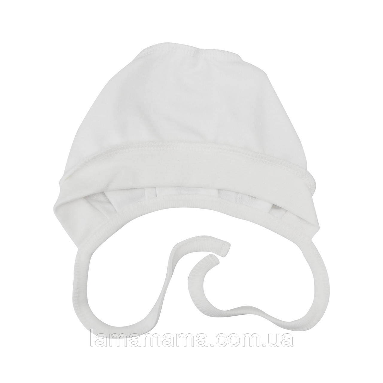 Чепчик на зав'язках із зовнішніми швами бавовняний для новонароджених дівчаток М'якенькі лапки Молочний Minikin, фото 1