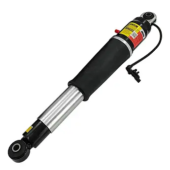 Амортизатор стійка пневмо задня Cadillac Escalade Камілак Ескалійд 84176675