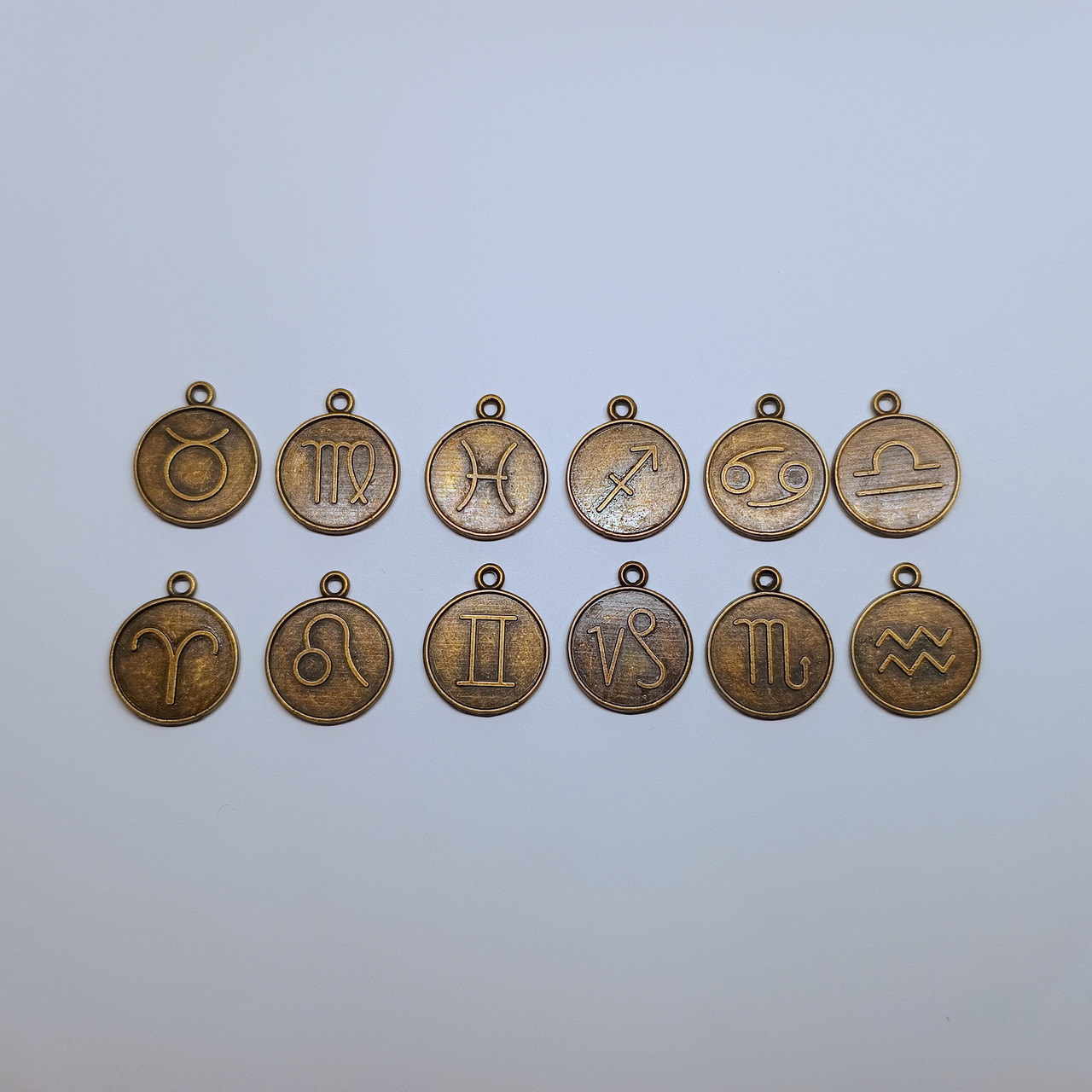 Підвіски металеві Finding Кулони круглі знаки зодіаку двосторонні Антична бронза 21.5 x 18 мм Комплект 12 штук xcp001359