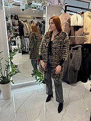 Жіноча куртка-жилетка з хутра єнота