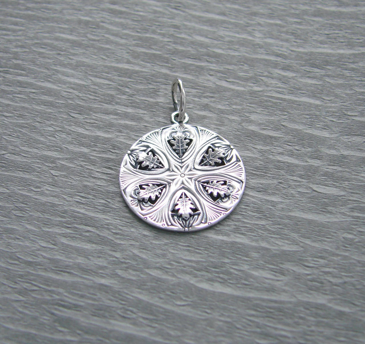 

"Перун-Громовержец" с дубовыми листьями - славянский оберег из серебра 925 пробы