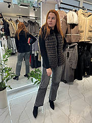 Хутряна жилетка з єнота