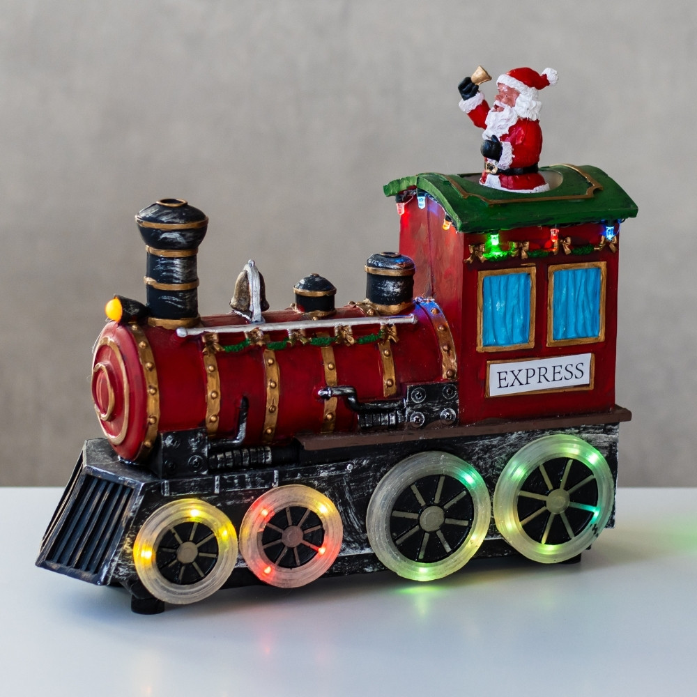 Фігурка Новорічна з підсвічуванням та музикою Паровоз із Сантою 28х23,5 см працює від батарейок 16026-006