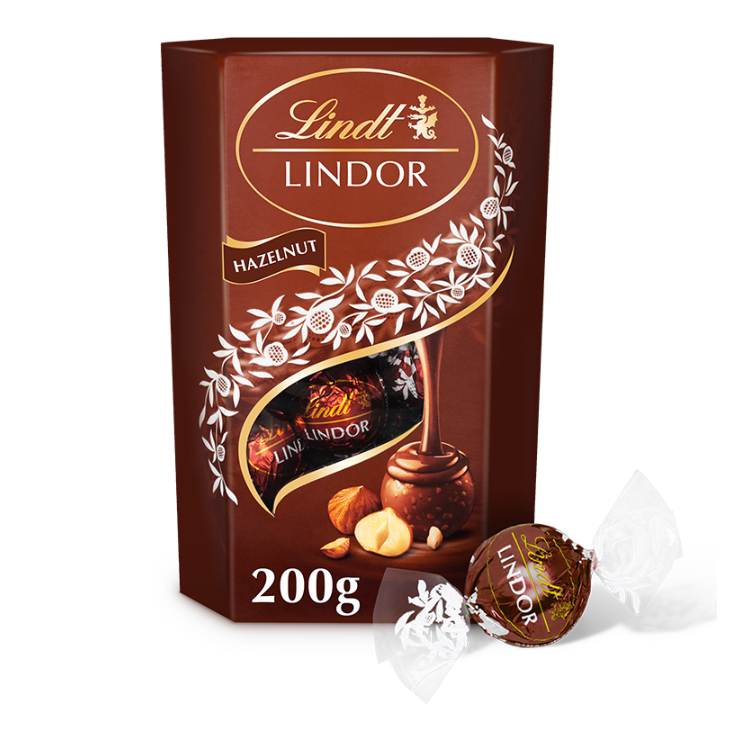 Цукерки Lindt Lindor Hazelnut з молочного шоколаду зі шматочками лісового горіха, 200г