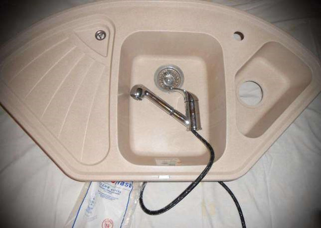 мийка штучний камінь