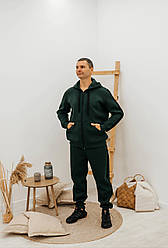 Чоловічий зручний спортивний костюм на флісі з капюшоном і кишенями зелений