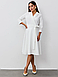 Витончене та стримане жіноче плаття-міді на зпах, молочно-біле, фото 4