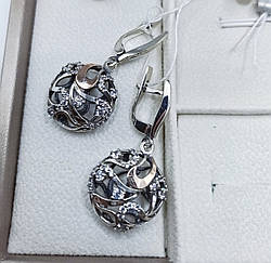 Ажурні срібні сережки з круглим підвісом та золотими напайками "Гузель"