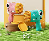 Мільний діно на 40 отворів для малюків рожевий на батарейках, фото 2