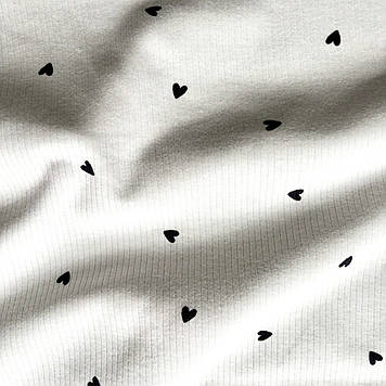 Інтерлок трикотаж преміум класу з прінтом сердечка на молочному